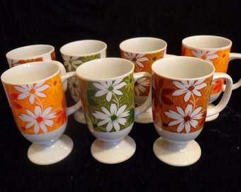 Flower Power 70s Daisy Pedestal Mugs, Set of 7 70s Psycheldelic Mugs with 70s Green, Orange and Brown Tones, Mod Daisies Cups