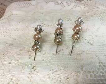 Brown pearl decorative stick pins. 2", 3 pack. Comes with decorative holder.