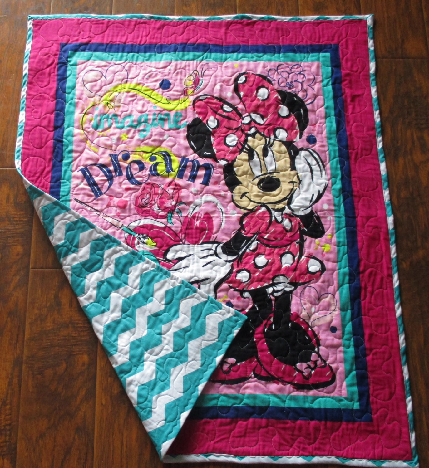 quilted minnie with metal logo