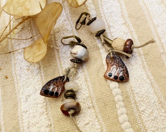 Tribal earrings and rustic earth tones. Match the necklace below. Fimo textured and tinted. Unique creation.
