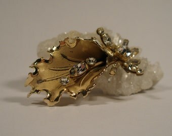 Vintage gold tone leaf with sprig and rhinestone brooch