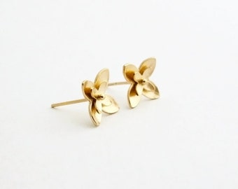 Items similar to Lovely little flowers gold studs earrings, handmade