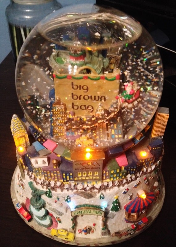 bloomingdale s big brown bag snow globe wind up musical bloomingdale s big brown bag snow globe wind up musical