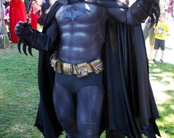 Batman Cape with bat wing detailing on hem custom sewn to fit you for your batman cosplay costume. The pics are an 8 panel design.