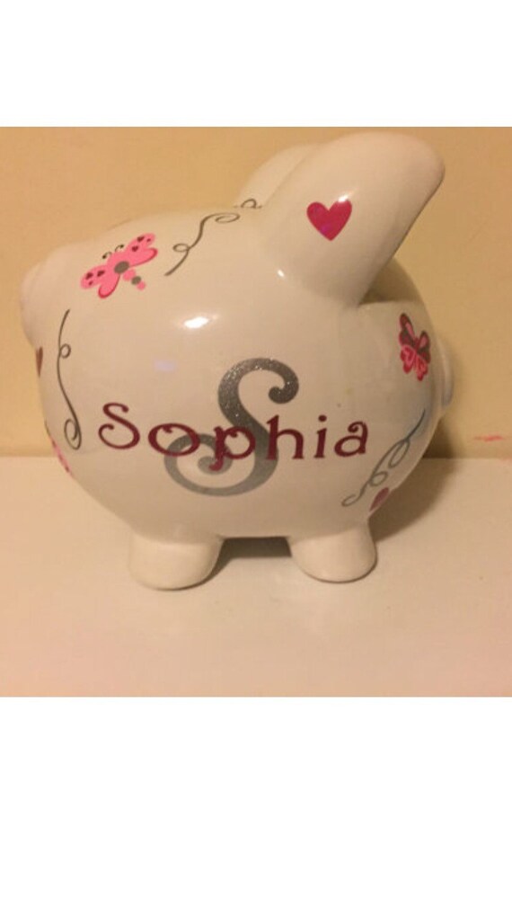 Personalized piggy bank. Name Lila with name in pink and