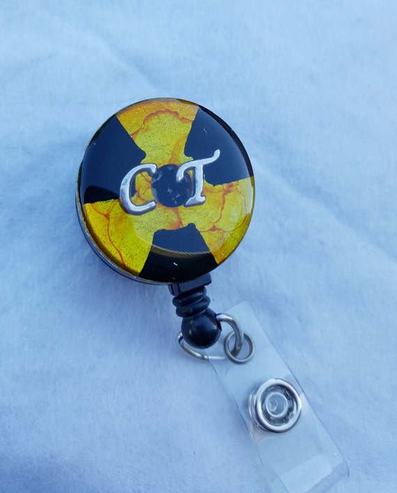 Radiology tech CT name badge holder with radiation symbol