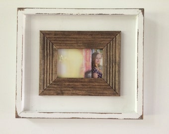 Lightly distressed, shadow box 5x7 picture frame in white.