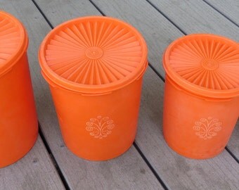 Vintage Orange Tupperware Storage Set With Design on Front