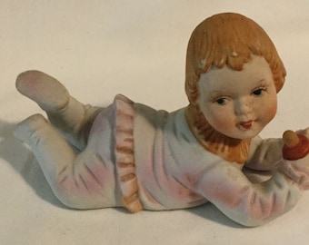 Vintage Porcelain Piano Baby Figurine