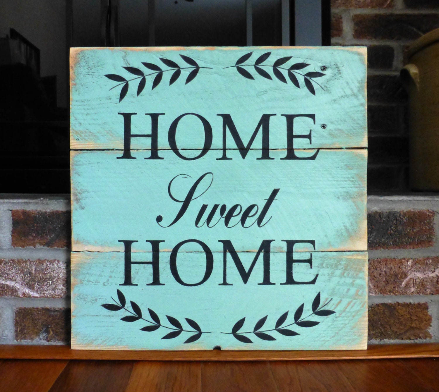 Home sweet home sign hand painted on reclaimed wood