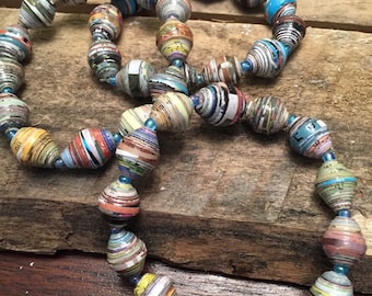 Items similar to Cuff Bracelet. Multi-colored paper beads. on Etsy