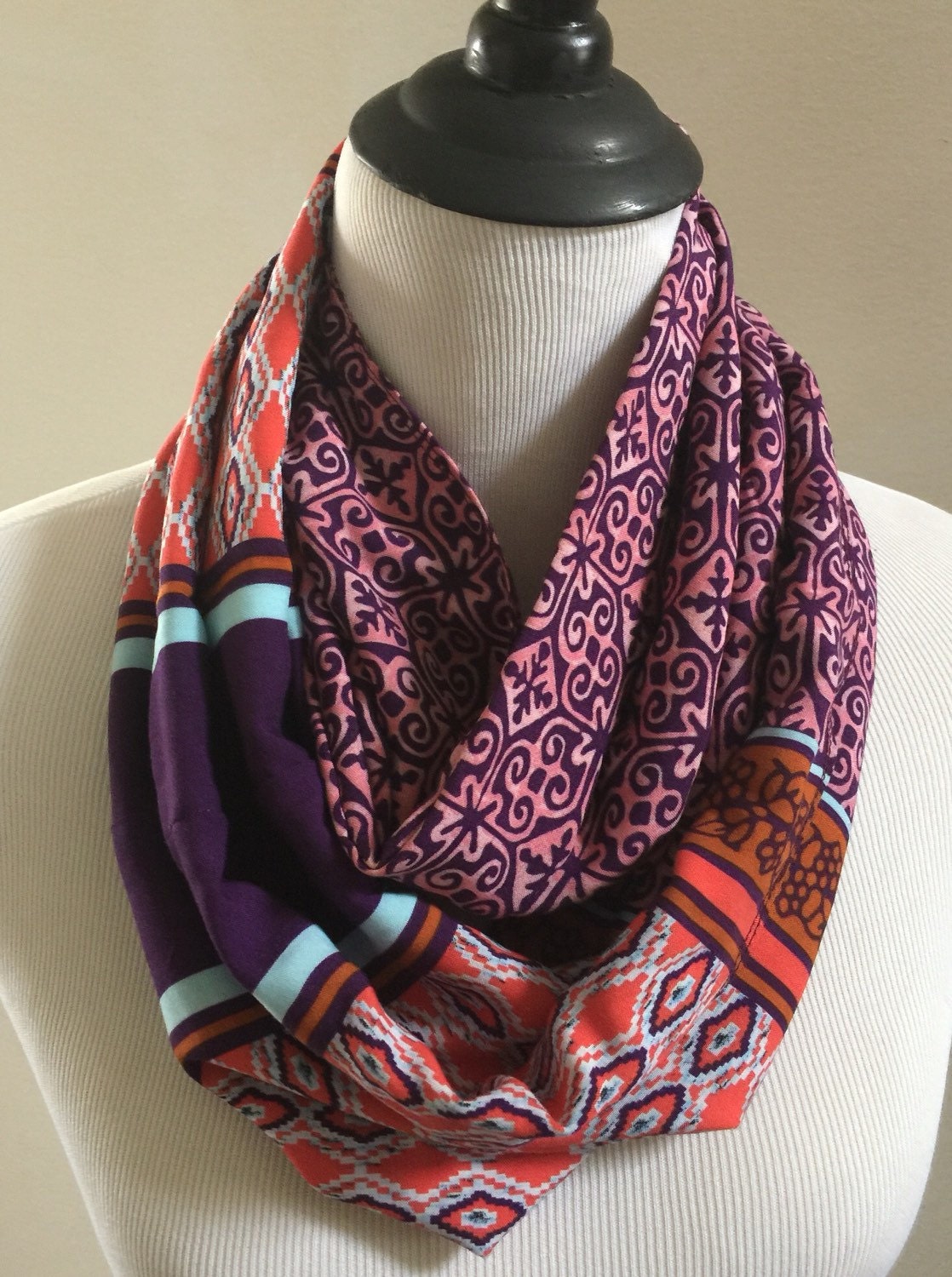 Boho circle scarf in orange purple combination. Scarf in a