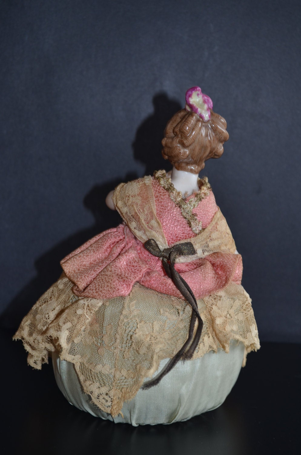 antique half doll pincushion