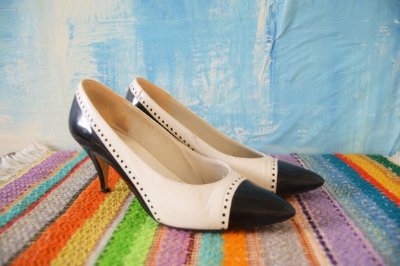 black wingtip heels