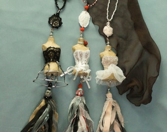 Decorative tasell mannequins vintage.