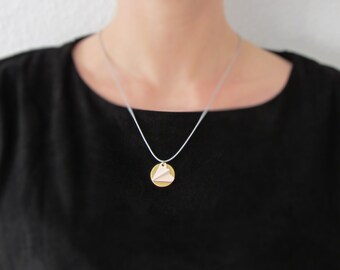 Paper plane concrete/brass necklace