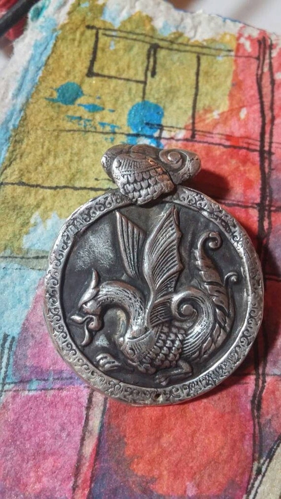 Fine silver dragon pendant
