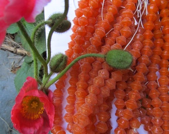Vintage Saturn Shaped In Sunkist Orange Glass Beads