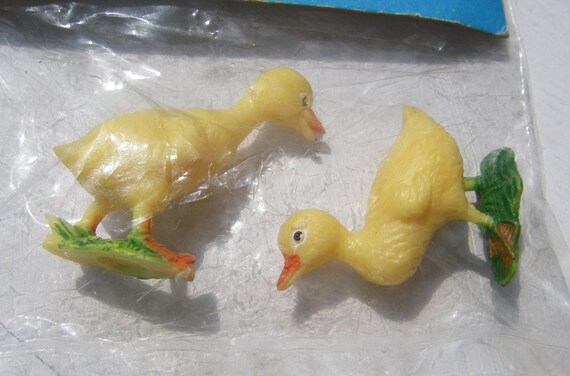 miniature plastic ducks