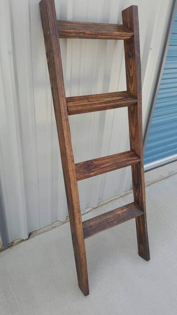 Rustic farmhousestyle quilt ladder reclaimed wood decor