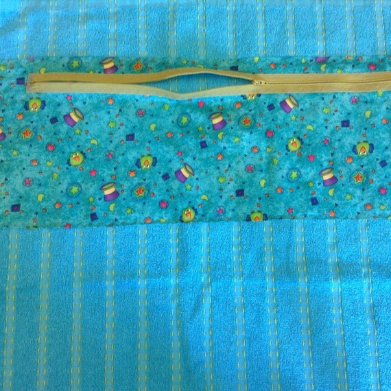 Beach towel with zippered pocket