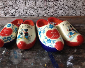 Personal, hand-painted, Dutch wooden clogs with name and image with farmer peasant girl for wedding and jubilee, all anniversary
