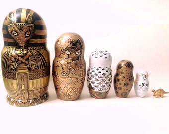 Hand painted russian dolls set with tiny dinosaur
