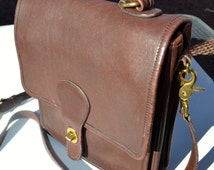 coach classic tote-um-table