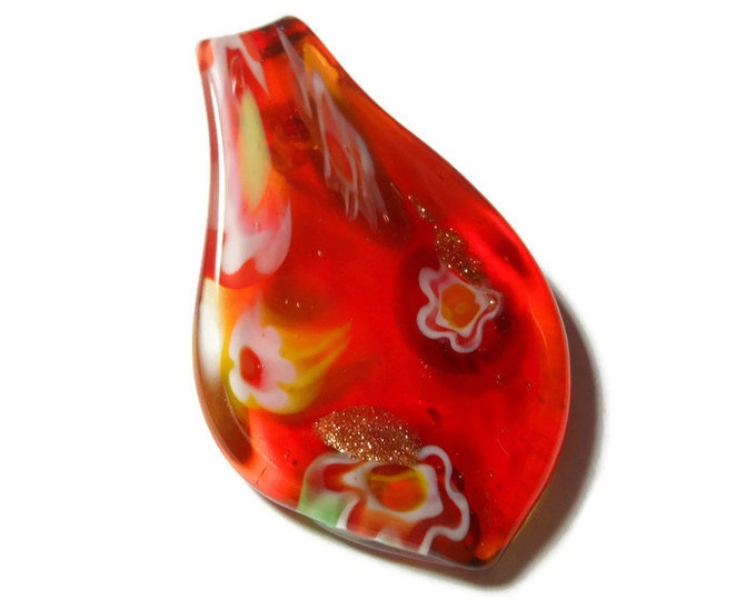 Large lampwork pendant, red yellow and white flowers float on a red background with gold glitter highlights, leaf shape, 60mm X 33mm
