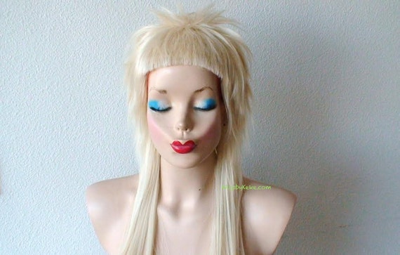Cosplay wig. Blonde choppy layers short bangs hairstyle wig.