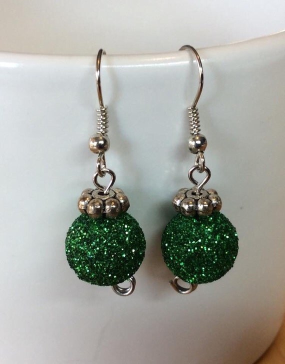 Items similar to Green ornament earrings on Etsy