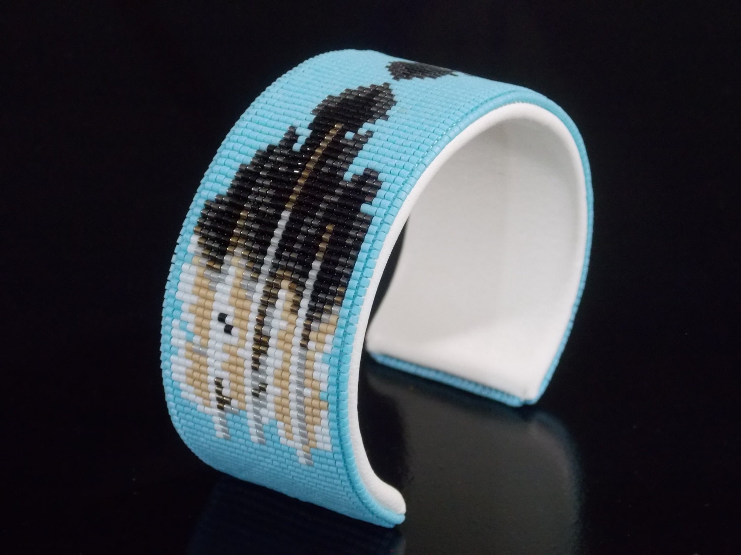 Native American Beaded Feather Bracelet With The Colors Of