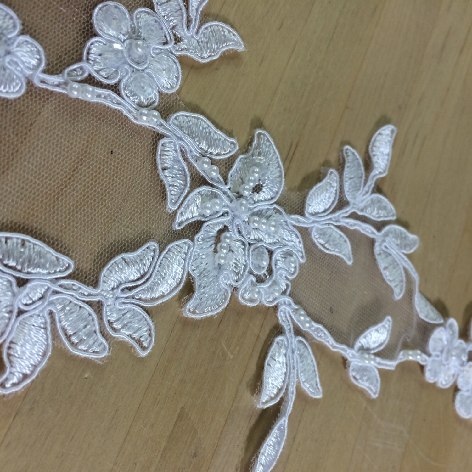 white beaded applique