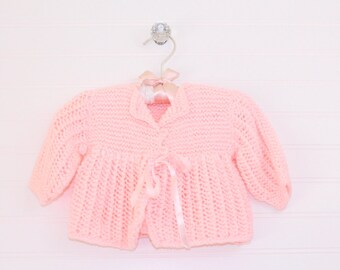 Vintage baby sweater, pink knit with 2 pearly buttons and satin ribbon tie, includes hat! size about 0-3 months