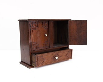 Carved Miniature Cabinet