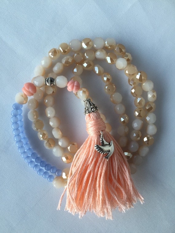 Items similar to Beaded Tassel Necklace Dove Charm Necklace with Pink