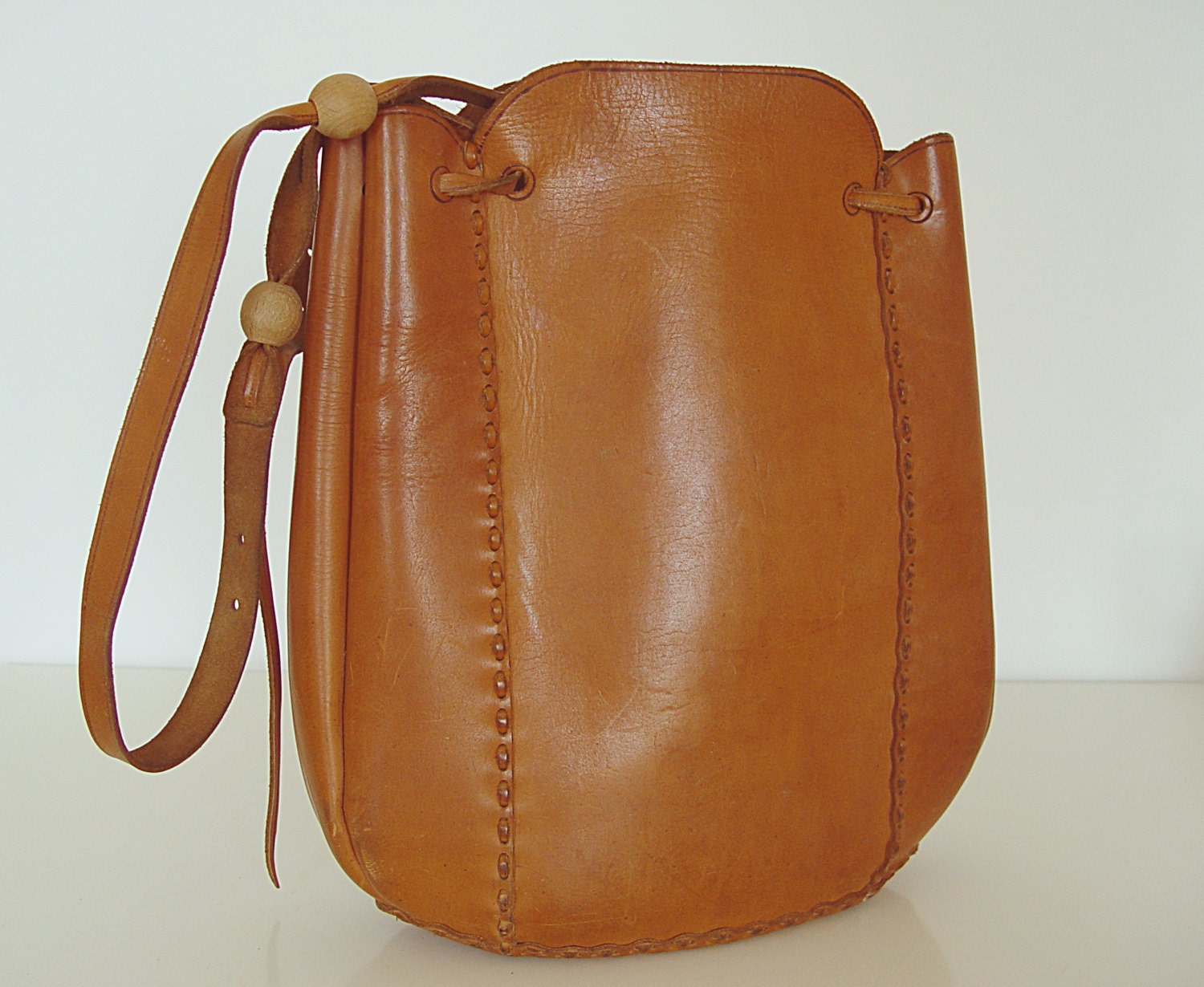 Brown leather bag.