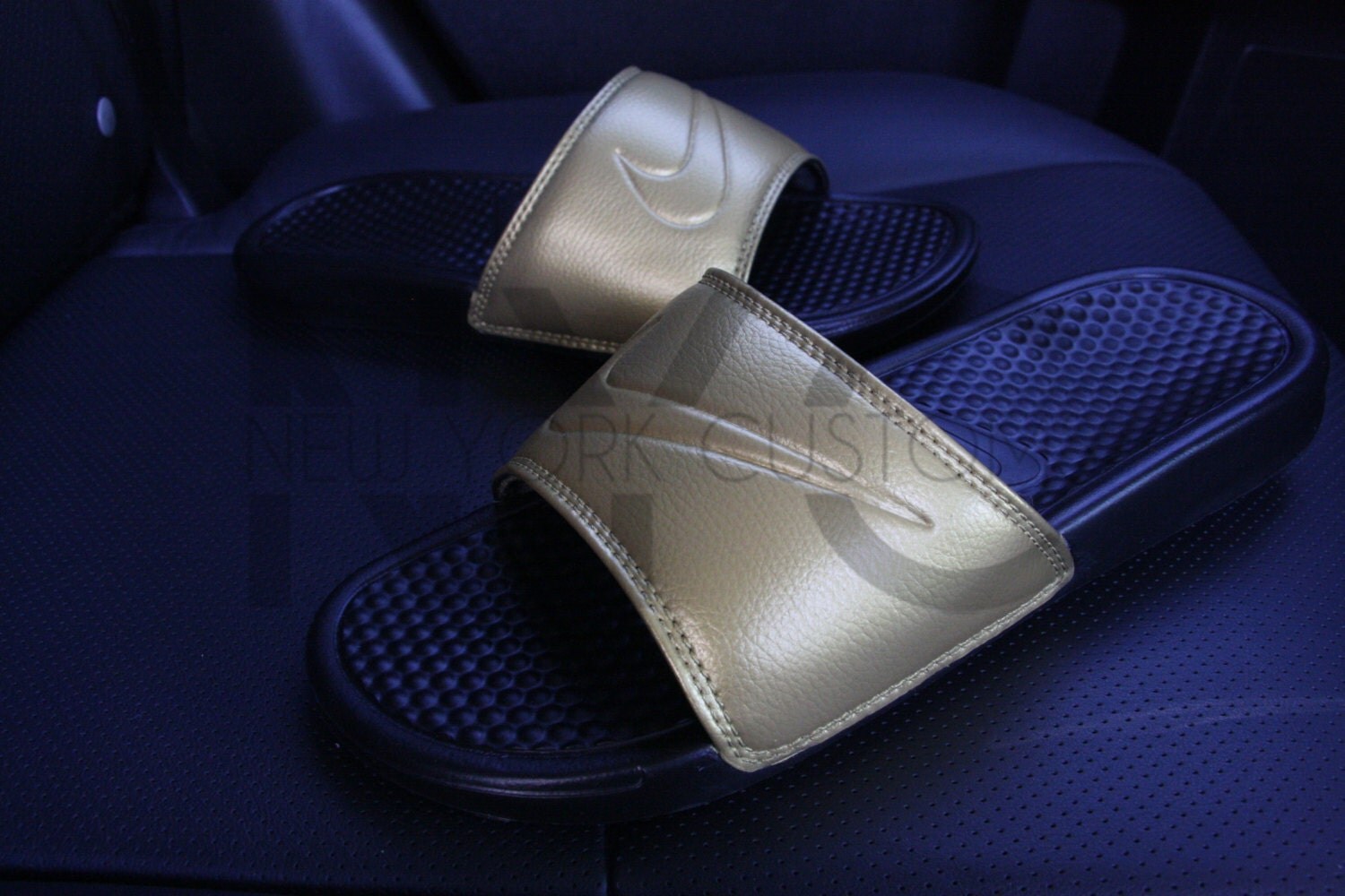 nike slippers black and gold