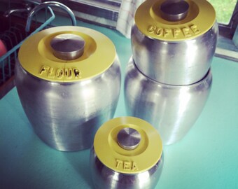 SALE! 1950's Kromex Spun Aluminum Round Canister Set with Yellow Bakelite Lids