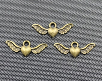 30pcs Winged Heart Charm Antique Bronze Tone 27x10mm - BH317