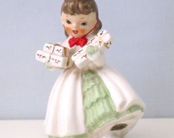 Pretty Vintage Napco Figurine Christmas Shopper With Holiday Presents