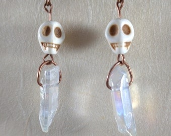 Stone skull and quartz point earrings
