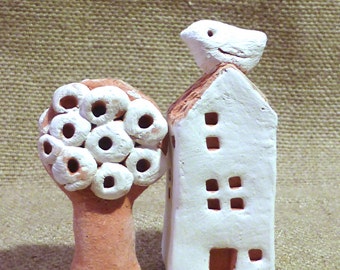 Miniature ceramic houses and trees
