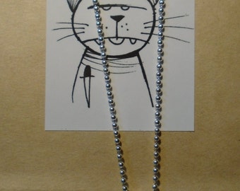 Pendentif: the cat eating fish