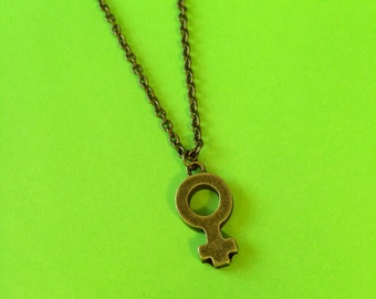 Items similar to Triple Goddess Venus symbol necklace on Etsy