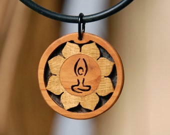 Yoga jewelry and handmade wooden pendant from an indialover. May peace prevail on earth.