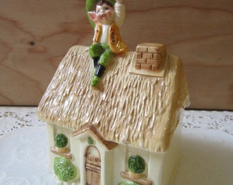 Vintage Gorham Japan Ceramic Coin Bank With Elf Sitting on a Thatched Cottage Rooftop