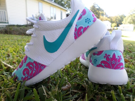 nike shoes with floral swoosh