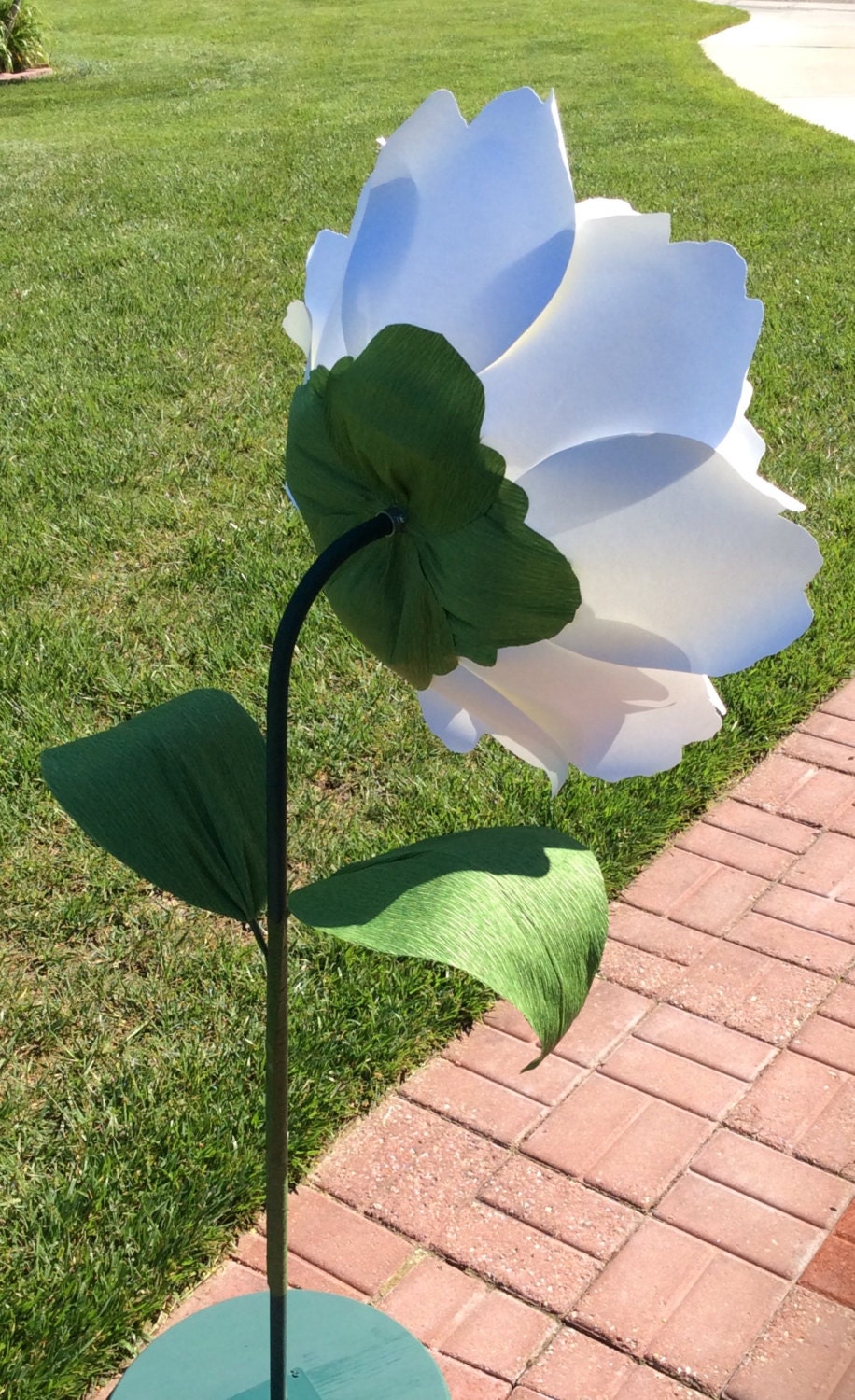 Giant paper flowers on stems free standing