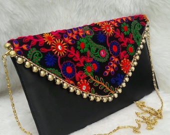 black embroidered clutch bag